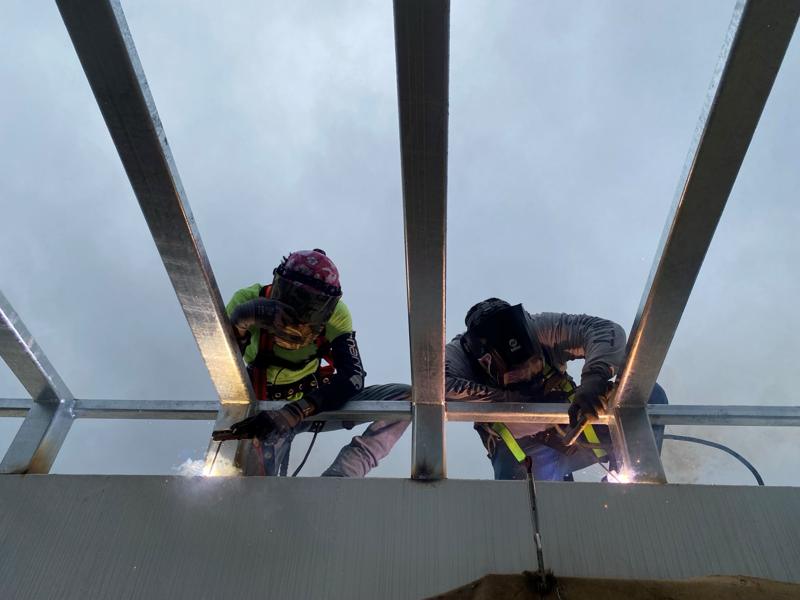GWC field crew welding structural steel framing on site