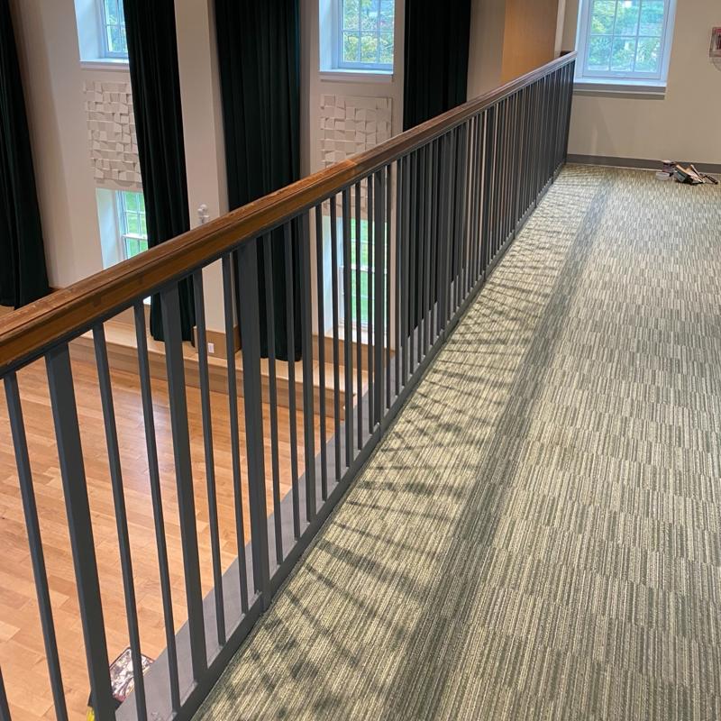Balcony guardrail with wood handrail at Foxcroft Music Building, Virginia. Steel work by General Welding Company