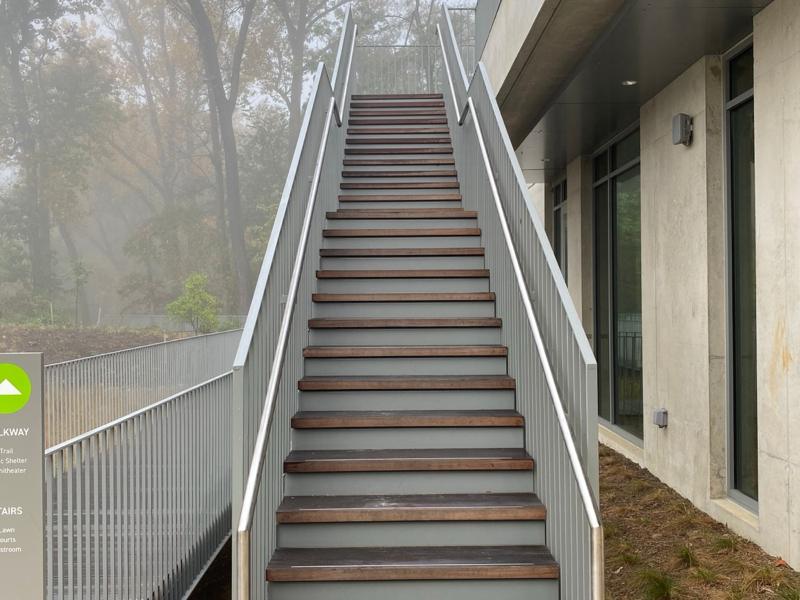 Exterior steel stair with railings at Lubber Run Community Center, Arlington, VA. Steel work by General Welding Company