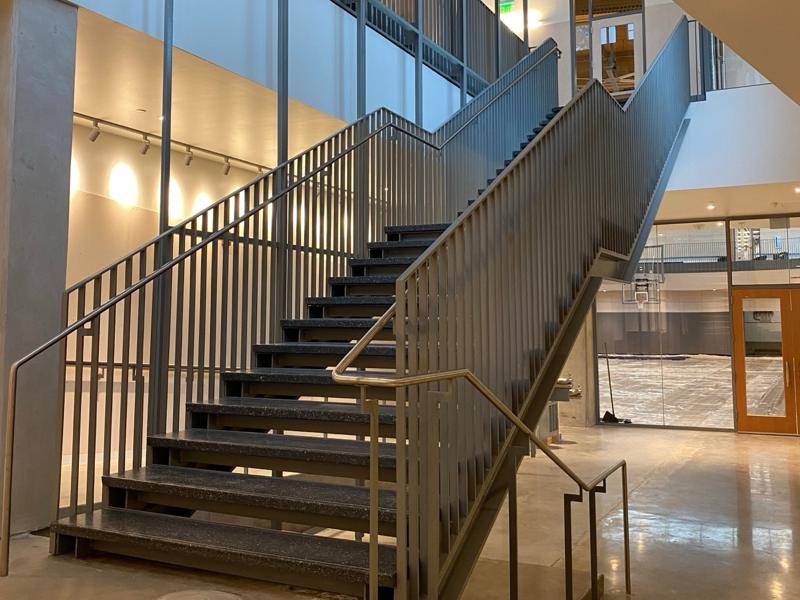 Steel feature stair with railings at Lubber Run Community Center
